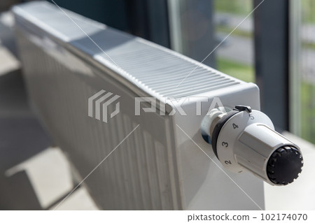 Close-up of white central heating floor radiator 102174070