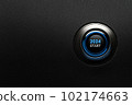 Start button Year 2024 blue glow on black leather background 102174663