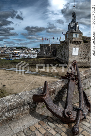 Big Anchor At Harborbridge Of Ancient City Concarneau With Medieval Stronghold At The Finistere Atlantic Coast In Brittany, France Big Anchor At Harborbridge Of Ancient City Concarneau With Medieval Stronghold At The Finistere Atlantic Coast In Brittany, France 102176123