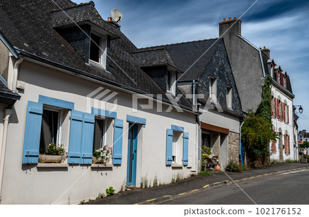 Street In Medieval Village And Artist Enclave Pont Aven At Finistere River Aven In Brittany, France Street In Medieval Village And Artist Enclave Pont Aven At Finistere River Aven In Brittany, France 102176152