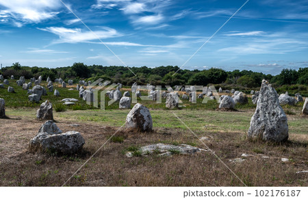 Ancient Stone Field Alignements De Menhir Carnac With Neolithic Megaliths In Brittany, France Ancient Stone Field Alignements De Menhir Carnac With Neolithic Megaliths In Brittany, France 102176187
