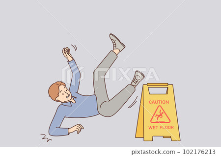 Man falls near warning sign with words caution wet floor due to negligence and inattention 102176213