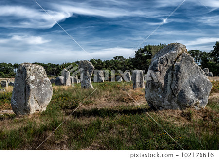 Ancient Stone Field Alignements De Menhir Carnac With Neolithic Megaliths In Brittany, France Ancient Stone Field Alignements De Menhir Carnac With Neolithic Megaliths In Brittany, France 102176616