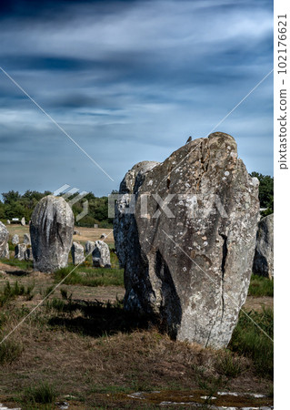 Ancient Stone Field Alignements De Menhir Carnac With Neolithic Megaliths In Brittany, France Ancient Stone Field Alignements De Menhir Carnac With Neolithic Megaliths In Brittany, France 102176621