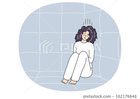 Sick woman in straitjacket sit in madhouse 102176648
