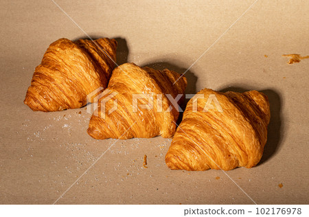 Fresh french croissants row. Puff craft bakery 102176978