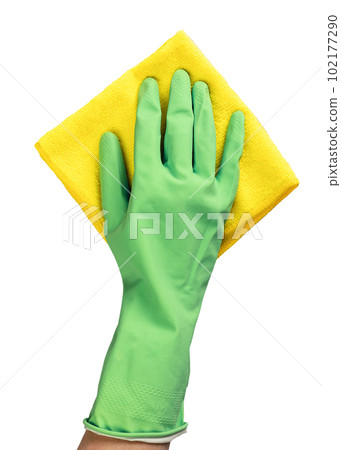 Wiping with yellow fiber cloth. Hand in glove with wiper, duster isolated on white background 102177290