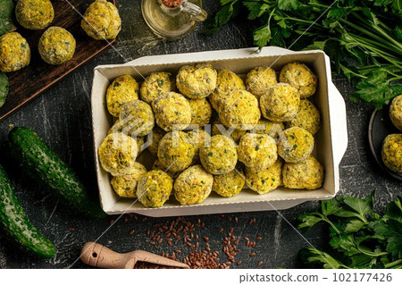 Portion of packed falafels in a box Portion of packed falafels in a box 102177426