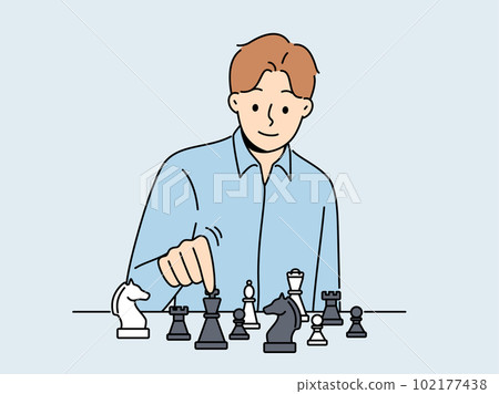 Smiling man playing chess 102177438