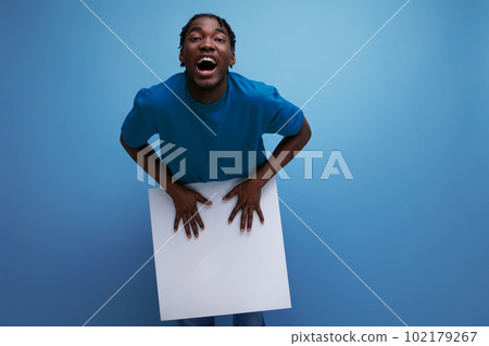 positive african young man with paper placard for notes positive african young man with paper placard for notes 102179267