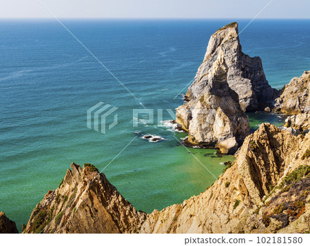 Wonderful view of Praia da Ursa (bear beach) and its huge rocky formations Ursa and Gigante stones, Cabo da Roca cape, Portugal 102181580