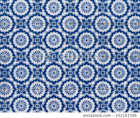 Traditional tiles with blue and white  geometric shape, adorning the facades of the houses in Aveiro, Portugal 102181586