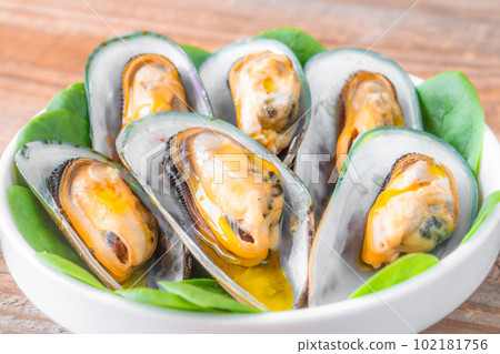 Baked half shell mussels Baked half shell mussels 102181756