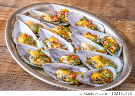 Baked half shell mussels Baked half shell mussels 102181758
