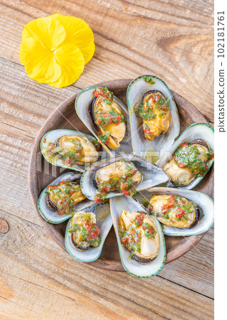 Baked half shell mussels Baked half shell mussels 102181761