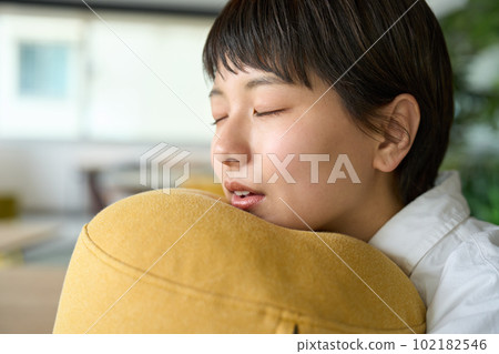 woman with tired expression woman with tired expression 102182546