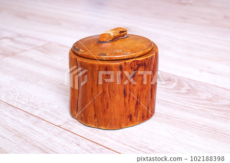 Wooden box with threads and needles closeup Wooden box with threads and needles closeup 102188398
