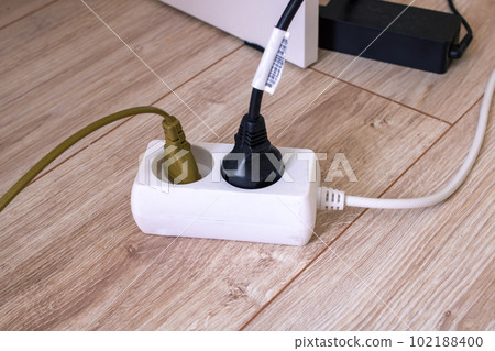 Extension cord with two sockets on the floor 102188400