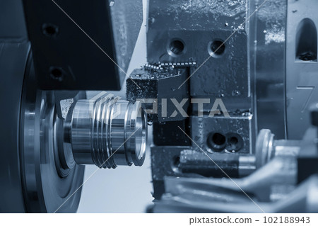 The multi-tasking CNC lathe machine swiss type finish cut the metal pipe parts. The multi-tasking CNC lathe machine swiss type finish cut the metal pipe parts. 102188943