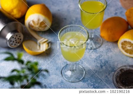 Traditional italian limoncello or lemon liquor 102190216