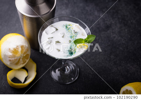 Cocktail or mocktail with lemon and mint 102190290
