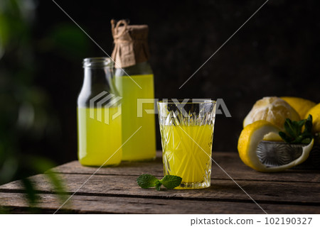 Traditional italian limoncello or lemon liquor Traditional italian limoncello or lemon liquor 102190327