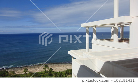 Spending time on the lanai at a tropical resort hotel 102191431