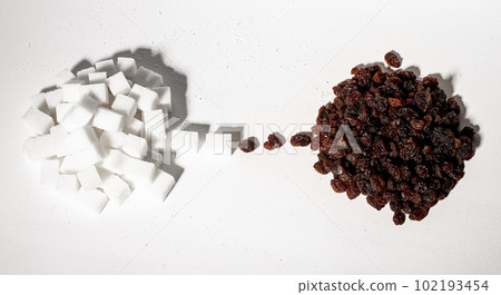 Substituting refined sugar for healthy natural sweet food, raisins Substituting refined sugar for healthy natural sweet food, raisins 102193454