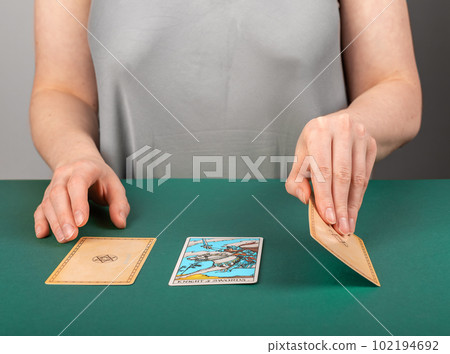 Lodz Poland April 15 2023 tarot reader, fortune teller with tarot cards during divination 102194692