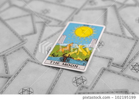 Lodz Poland April 15 2023 The Sun, major positive arcana on tarot cards background Lodz Poland April 15 2023 The Sun, major positive arcana on tarot cards background 102195199
