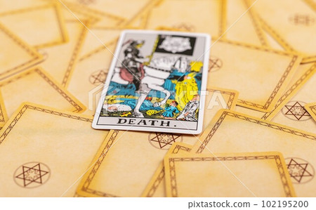 Lodz Poland April 15 2023 The Death, major bad negative arcana on tarot cards deck background. Taro divination concept 102195200