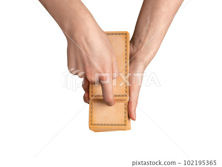 Lodz, Poland April 07 2023 Hands with tarot cards deck isolated on white 102195365