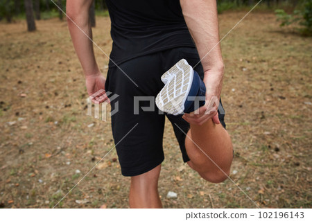 young athlete running in the forest young athlete running in the forest 102196143