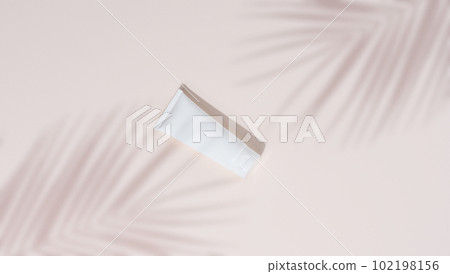 White plastic tubesfor cosmetics on a beige background, top view. Template for branding 102198156