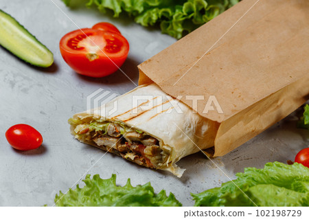 Shawarma sandwich gyro fresh roll of lavash chicken beef shawarma falafel RecipeTin Eatsfilled with grilled meat mushrooms cheese. Traditional Middle Eastern snack Shawarma sandwich gyro fresh roll of lavash chicken beef shawarma falafel RecipeTin Eatsfilled with grilled meat mushrooms cheese. Traditional Middle Eastern snack 102198729