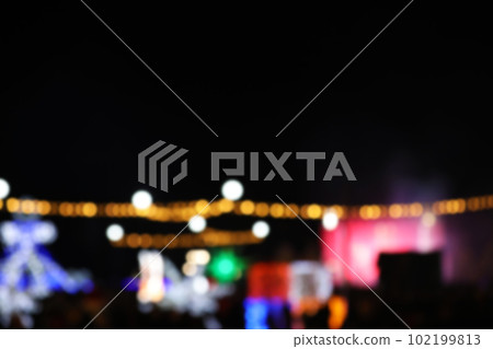 Blurred view of city street with festive lights at night. Bokeh effect Blurred view of city street with festive lights at night. Bokeh effect 102199813