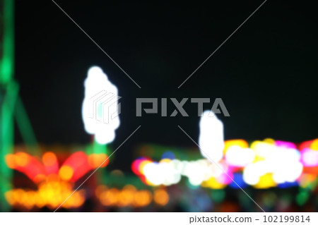 Blurred view of city street with festive lights at night. Bokeh effect Blurred view of city street with festive lights at night. Bokeh effect 102199814