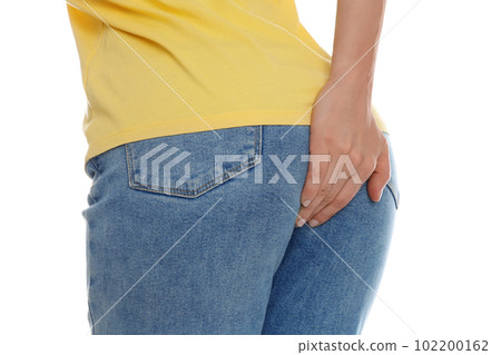 Woman suffering from hemorrhoid on white background, closeup 102200162