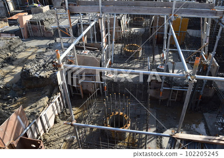 Building foundation construction site under construction Building foundation construction site under construction 102205245