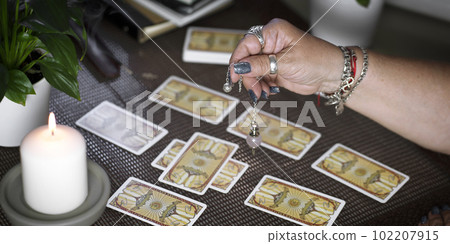 Concept of psychic advisor or ways of divination with cards. 102207915
