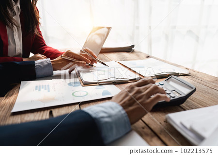 Business people meeting and working with financial report, talking about business plan for investment, finance analysis concept 102213575