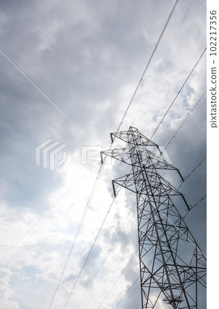 A cloudy sky and a steel tower A cloudy sky and a steel tower 102217356