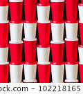 Seamless pattern of red and white paper coffee cups. Suitable for textiles, fabric, wrapping paper. Generative AI. 102218165