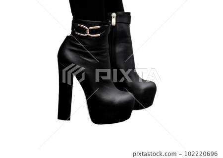 black leather boots with high heel isolated on a white backgroun 102220696