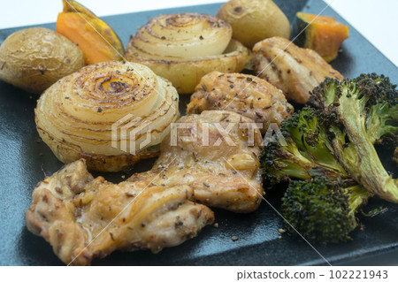Grilled chicken and vegetables in oven Grilled chicken and vegetables in oven 102221943