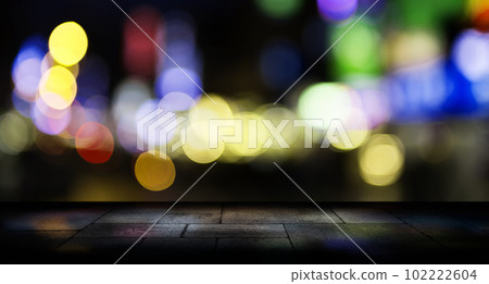 Concrete floor grunge texture with light bokeh in background. Concrete floor grunge texture with light bokeh in background. 102222604