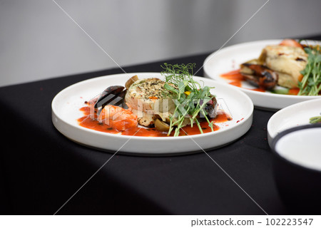 saganaki, traditional Greek cheese snack that is fried in a pan or grilled saganaki, traditional Greek cheese snack that is fried in a pan or grilled 102223547