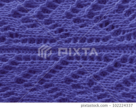 Handmade knitted background with macro wool threads. Handmade knitted background with macro wool threads. 102224337