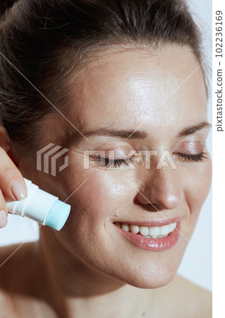 happy modern woman with highlighter stick 102236169