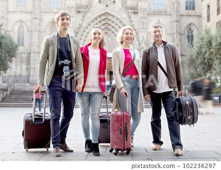 tourists with suitcases and camera walk in Barcelona tourists with suitcases and camera walk in Barcelona 102236297